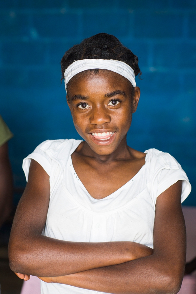 Haitian smiling school girl